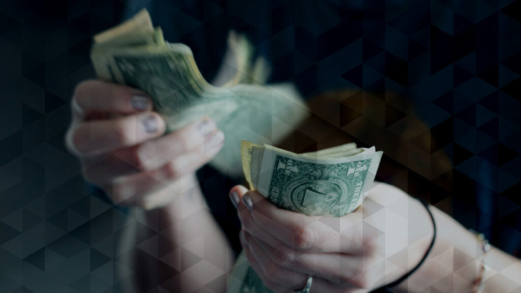 A woman counting money